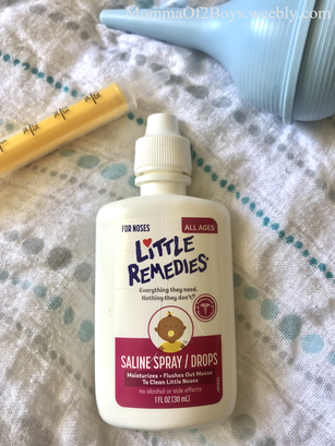 Picture saline drops and spray for your baby to help with their stuffy nose